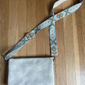 Elegant Cream Crossbody Bag with Geometric Strap